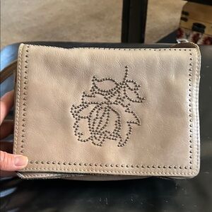 Chic Beige Leather Wristlet with Floral Design